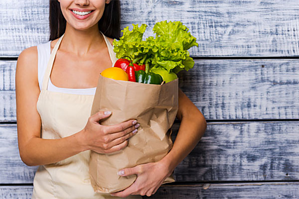 woman vegetables groceries